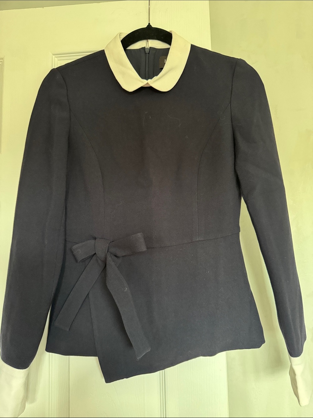 Classic Black Jacket with Contrasting White Collar